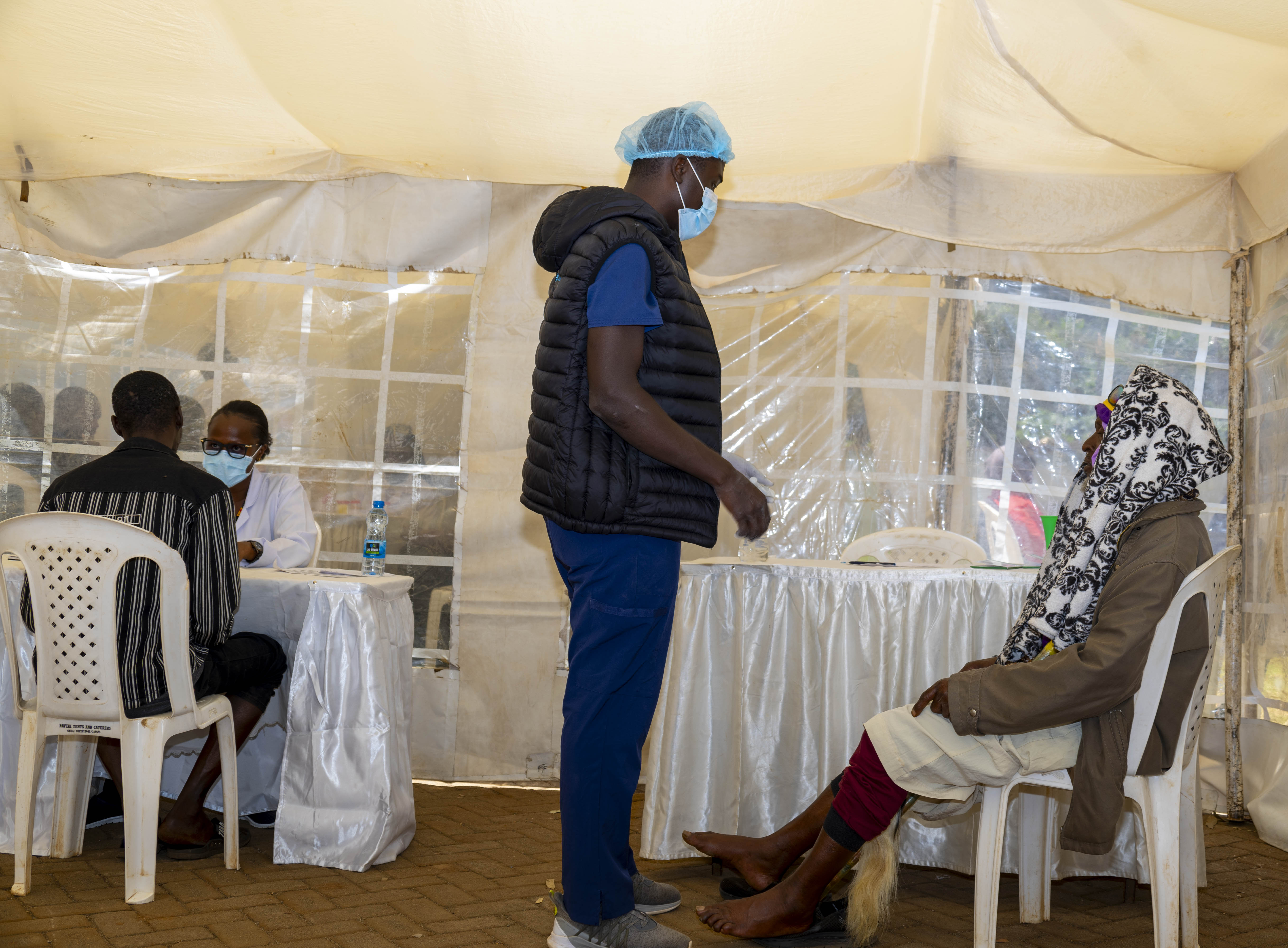 Community members receiving care at a Signature Foundation medical camp
